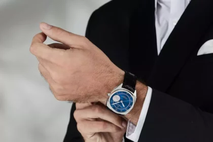Man adjusting his Bernhard H. Mayer Swiss-made watch