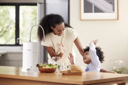 Mother and son drinking HomePure Nova filtered water