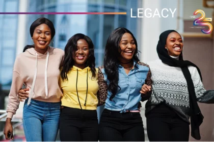 Group of African women with QNET 25th anniversary logo