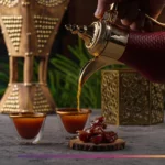 Pouring tea to break fast during Ramadan with dates