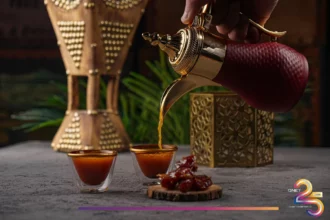 Pouring tea to break fast during Ramadan with dates