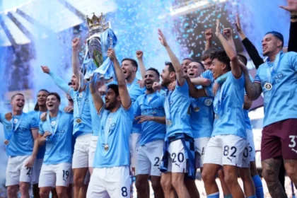 Manchester City lifting the 2023 EPL trophy