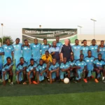 Football players posing at the QNET Manchester City football clinic in Nigeria