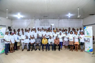 Participants in FinGreen Ghana, QNET's financial literacy programme, in Ho